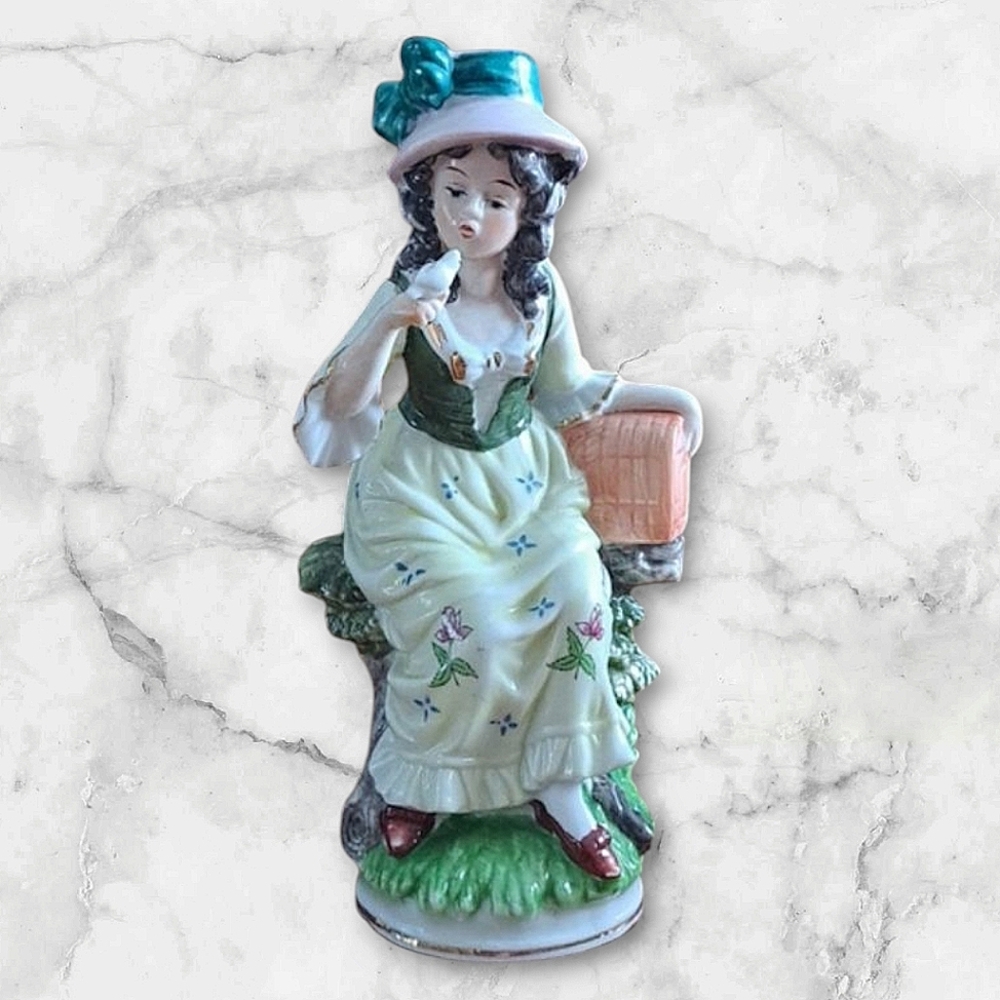 Vintage Porcelain Woman with Bird Figure